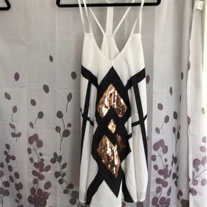 Black white and gold mini dress